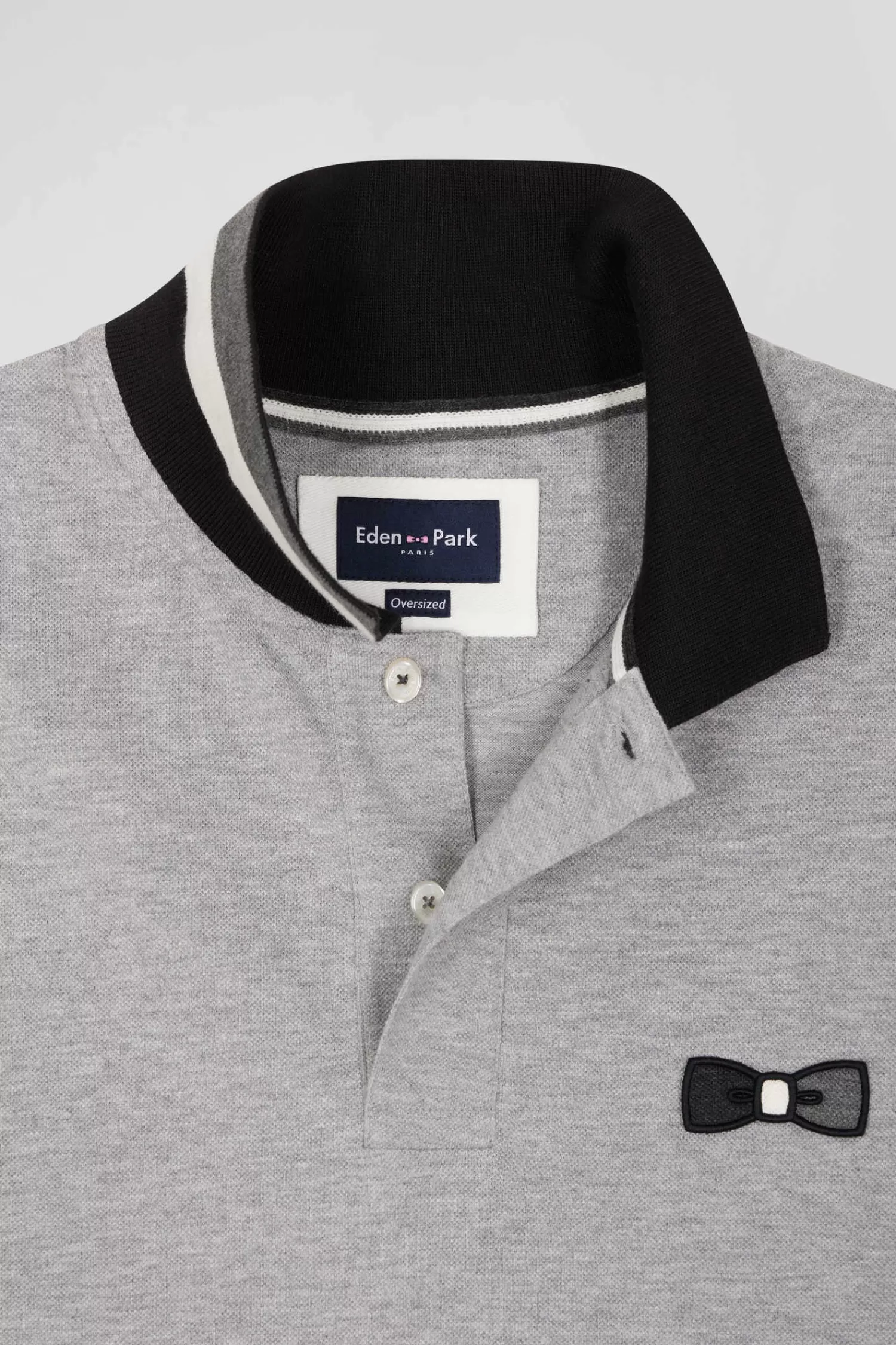 oversize_black_shortsleeved_cotton_piqu_polo_shirt_with_tricolor_details_6.webp Eden Park Oversize black short-sleeved cotton piqué polo shirt with tricolor details< Polos
